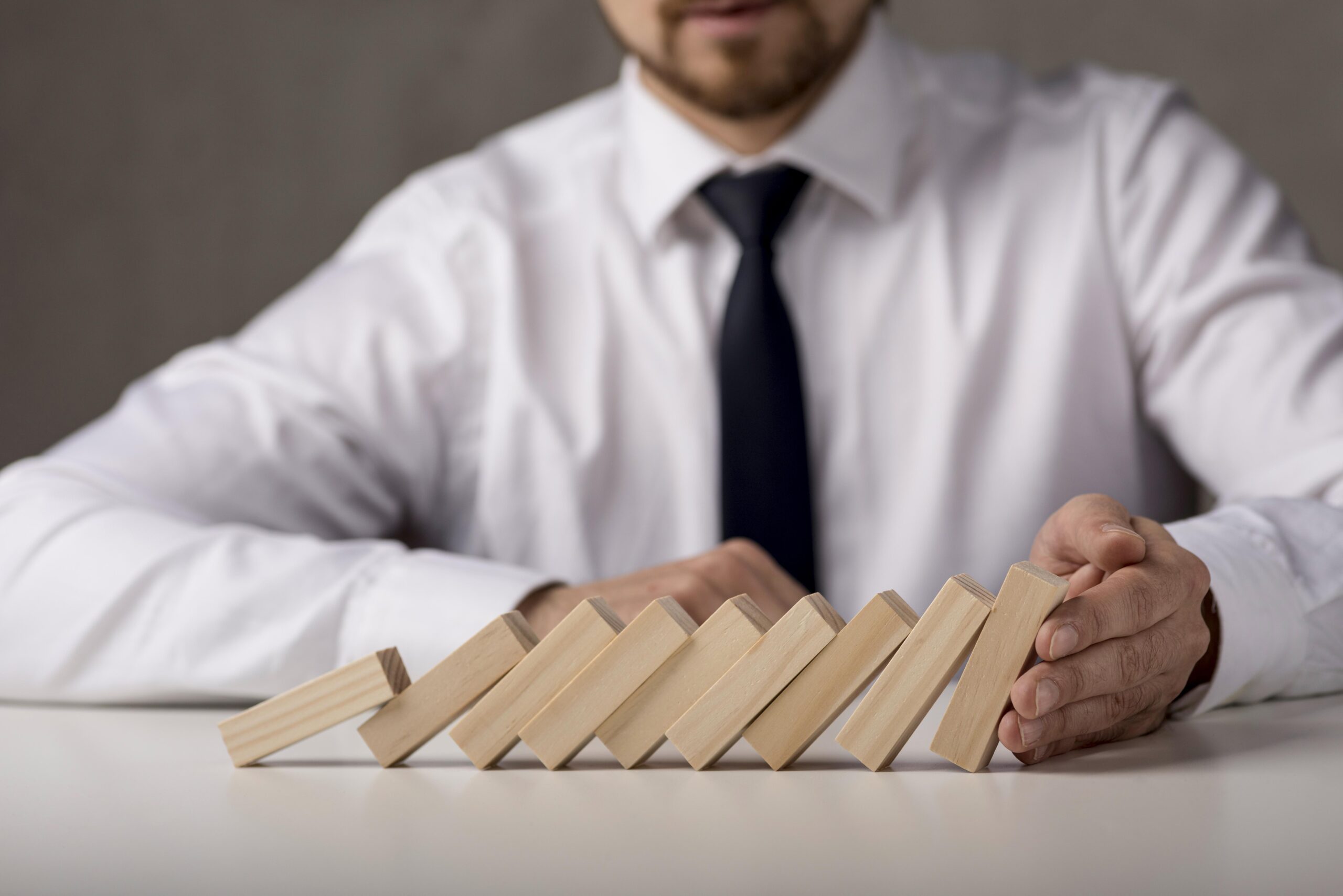 businessman-with-tie-dominoes